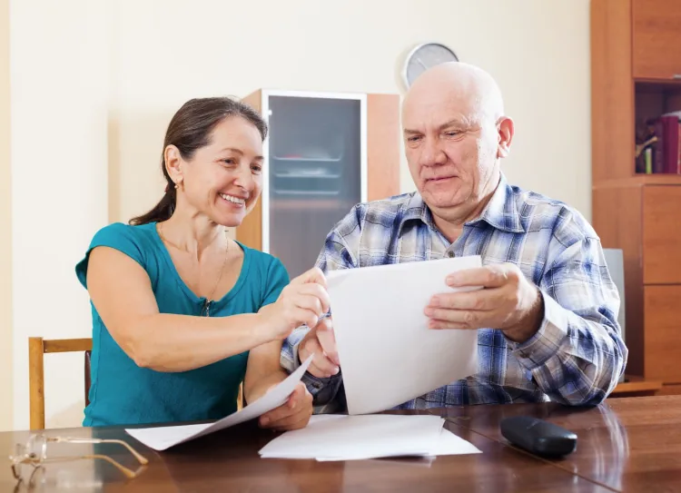 Customers reviewing their household energy bills together